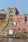 Varanasi - Kedara Ghat with the red and white-striped temple of Kedaresvara lingam